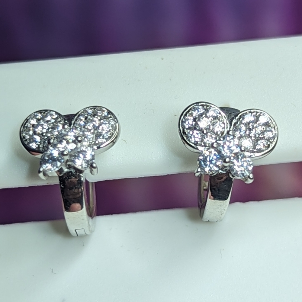 Silver butterfly hoops